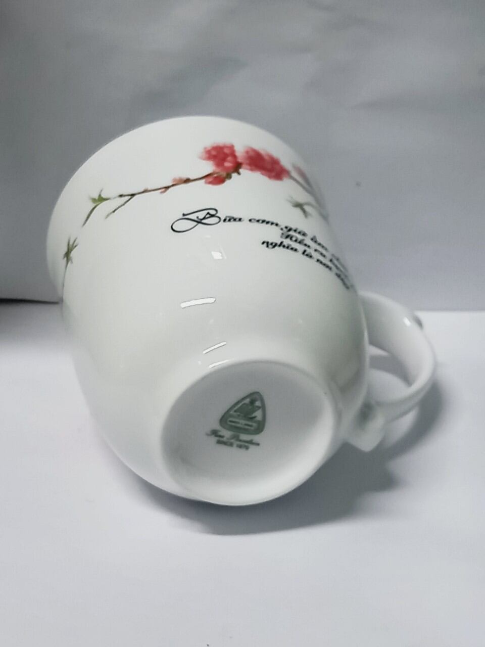 Ly sứ Minh Long họa tiết hoa đào