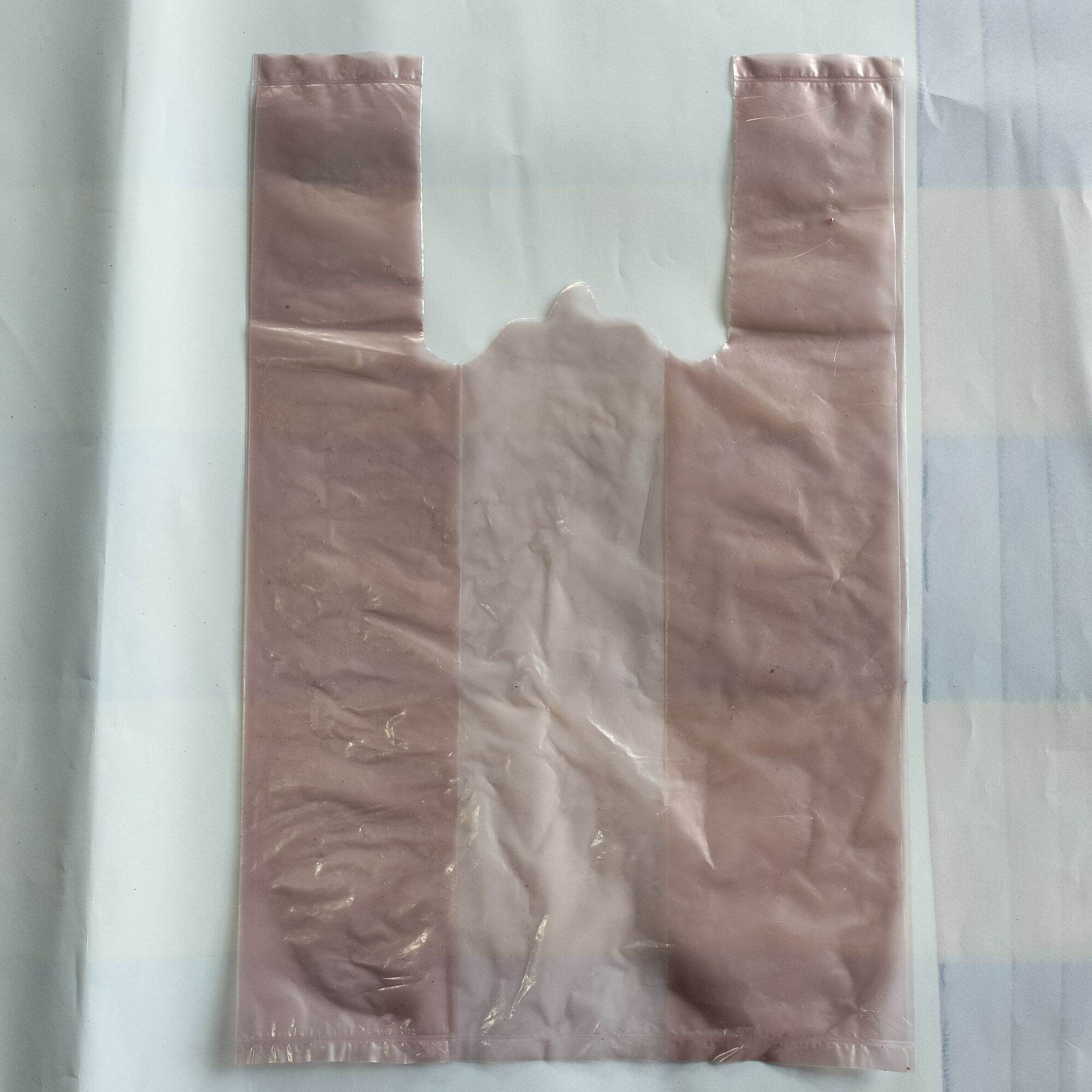 Túi xốp nilon màu mỡ có quai (1kg)