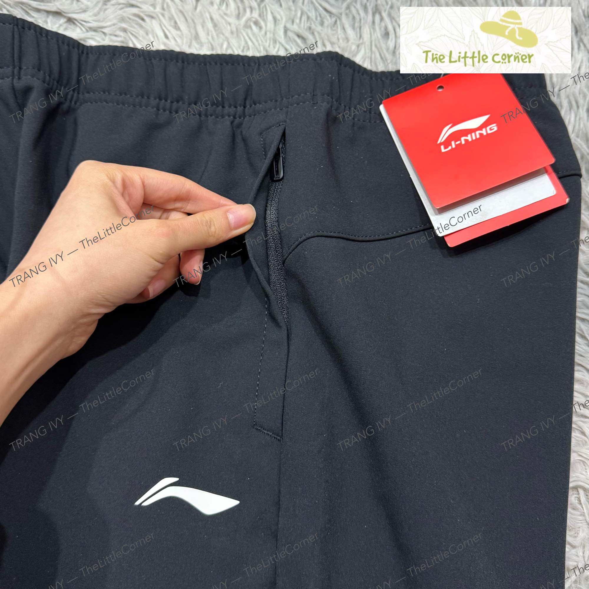 Quần gió lót nỉ nam Lining AYKR757
