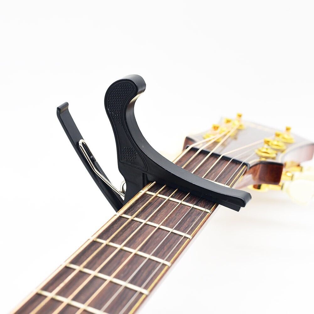 Capo kim loại dài cho đàn guitar (bằng kim loại ko phải nhựa)