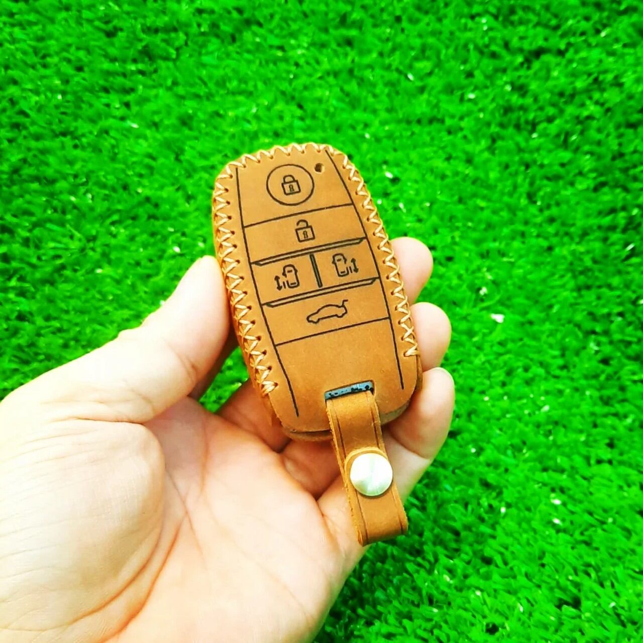 Bao da chìa khoá Kia Sedona handmade da thật