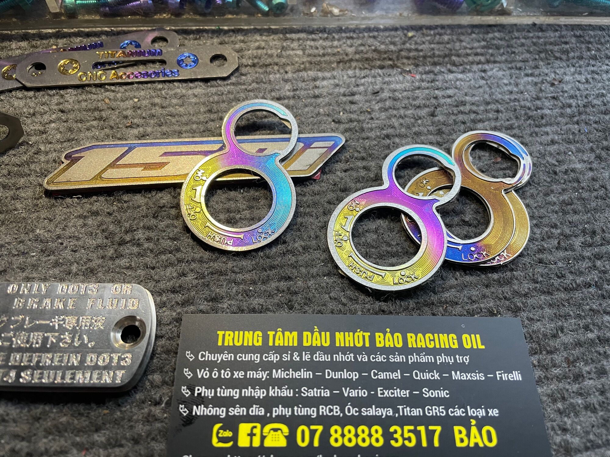 Miếng Dán ổ khoá Titan cho Satria Raider Fi các đời " chống trày khóa "