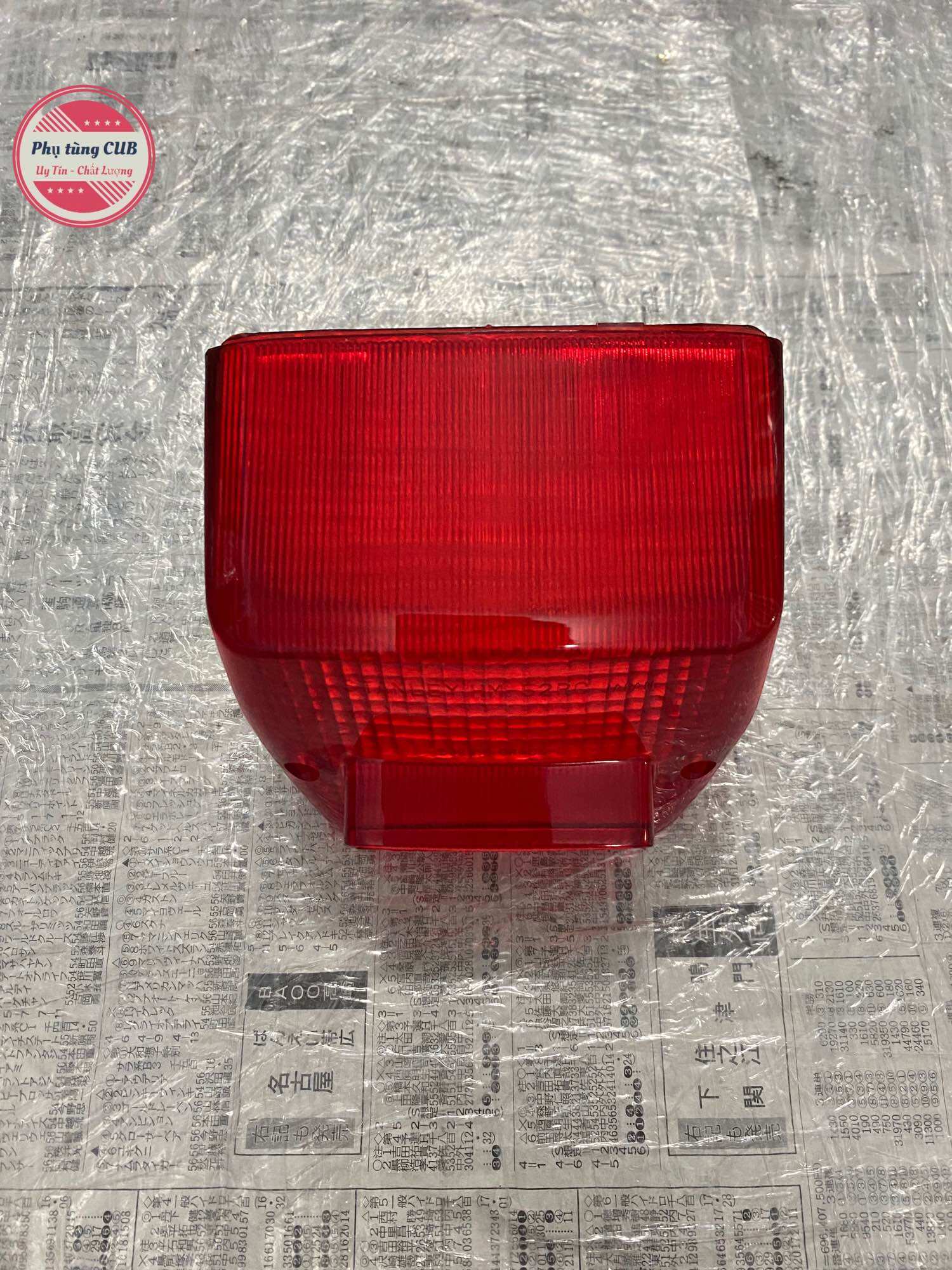 Chụp đèn hậu xe cub 82-84-DD hàng zin mới