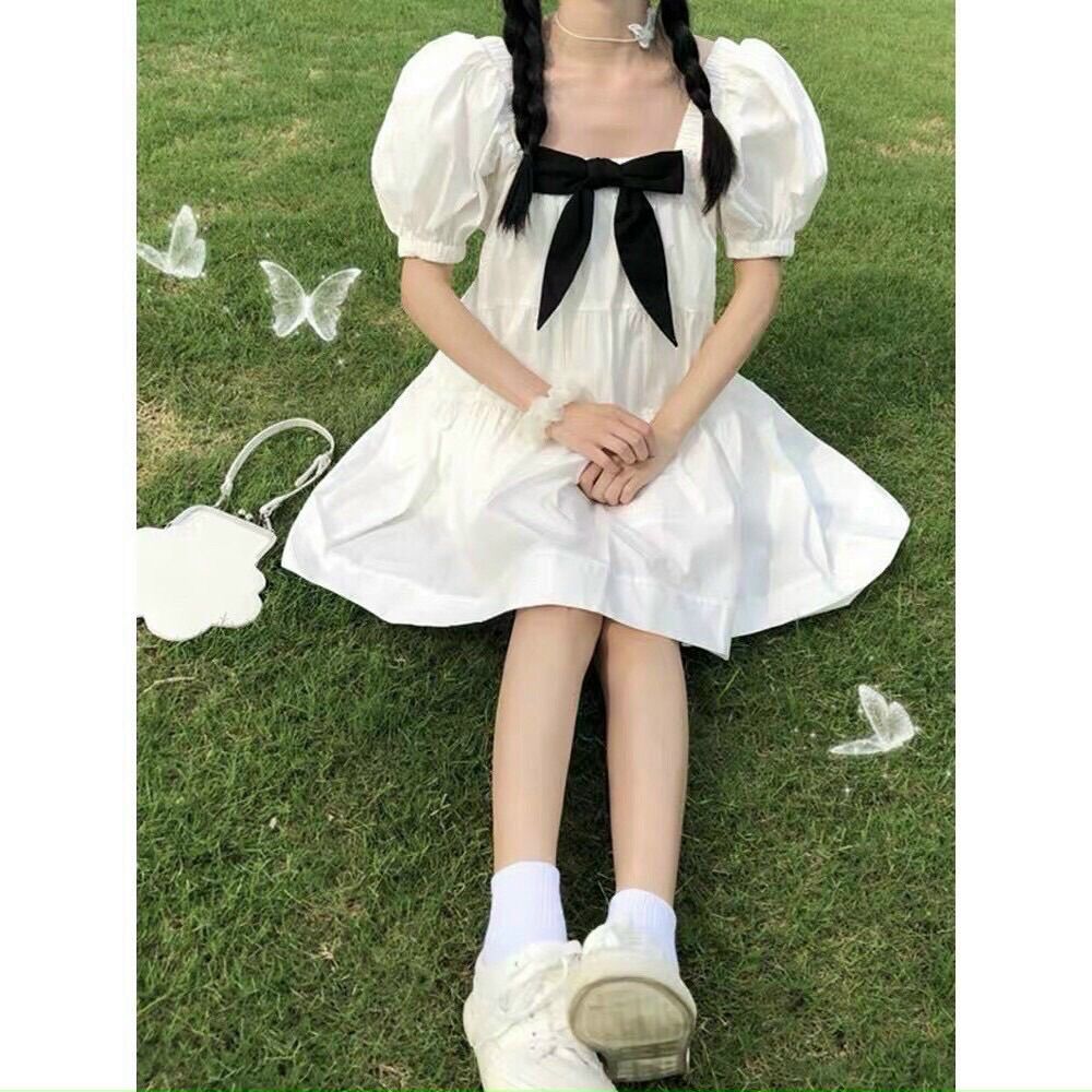 [HCM] Đầm babydoll trắng nơ đen siêu đáng yêu
