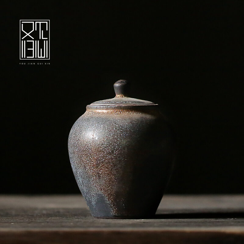 Lại thấy quy tâm đóng gói gốm mạ vàng hũ đựng trà hũ đựng kín gốm thô cỡ nhỏ hũ đựng trà phổ nhĩ dùng trong gia đình du lịch tiện mang theo
