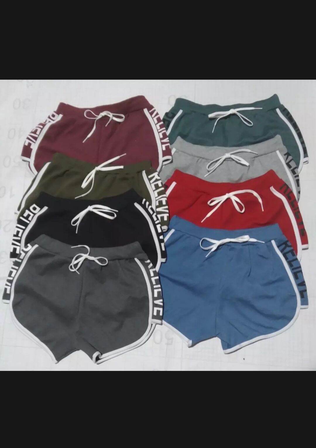 Quần short nữ phối chữ.