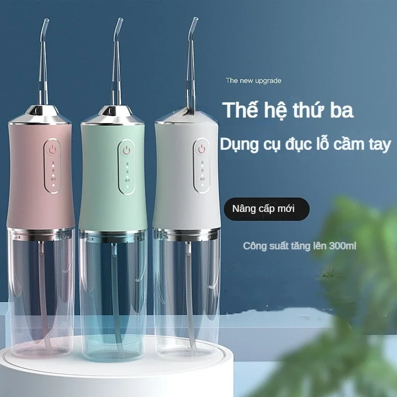 Máy tăm nước mini vệ sinh răng miệng kèm 4 đầu tăm
