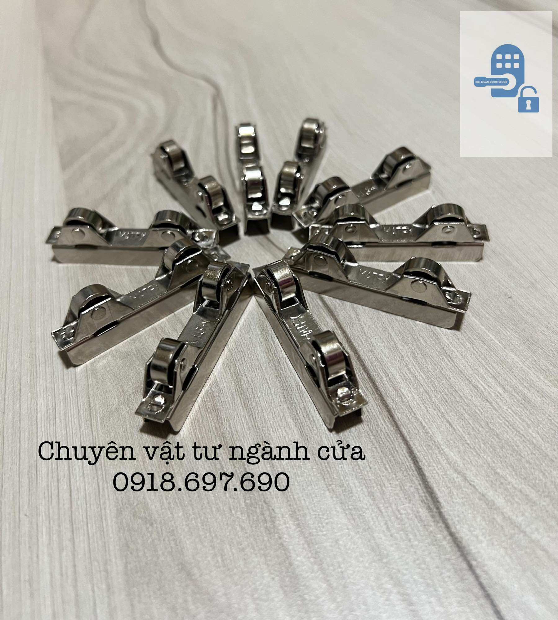 [ 10 bánh ] Bánh xe đôi kẹp kính tủ nhôm lùa .