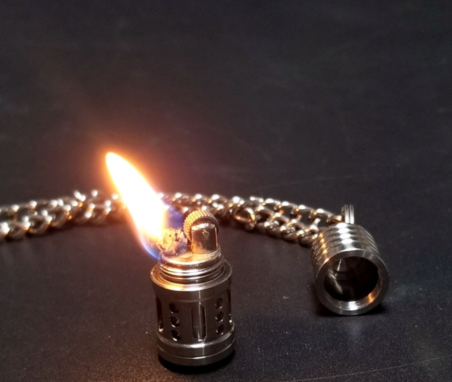 bật lửa titan treo móc khóa edc( KHÔNG XĂNG )