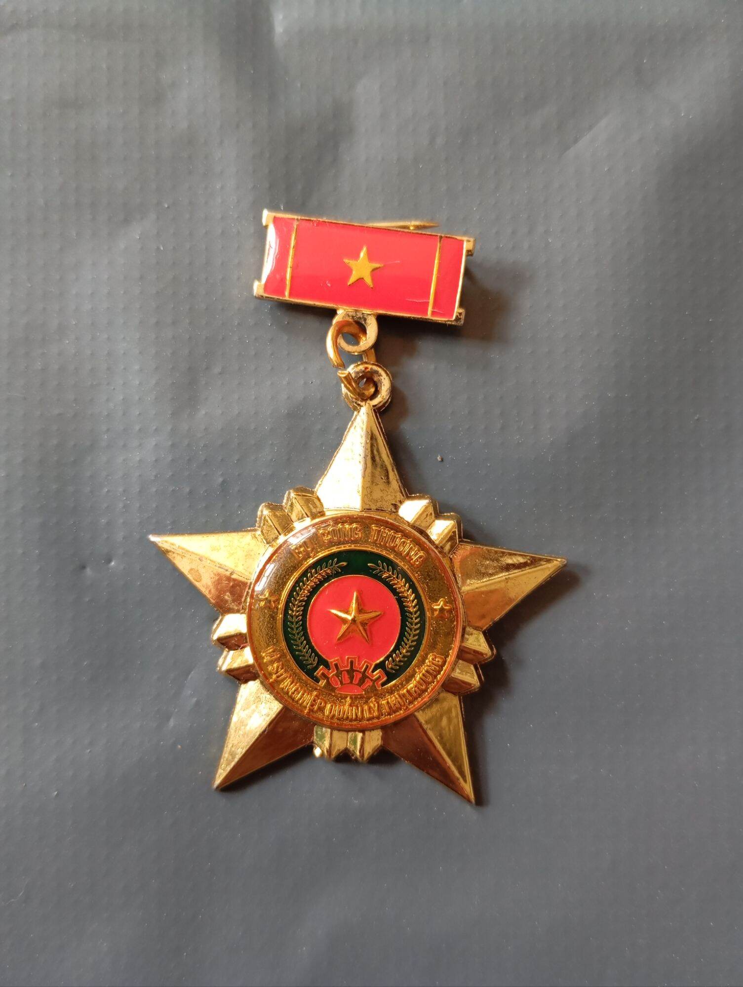 Kỷ niệm chương vì sự nghiệp Quản lý thị trường, B Công thương . huy hiệu biểu tượng Quản lý thị trường