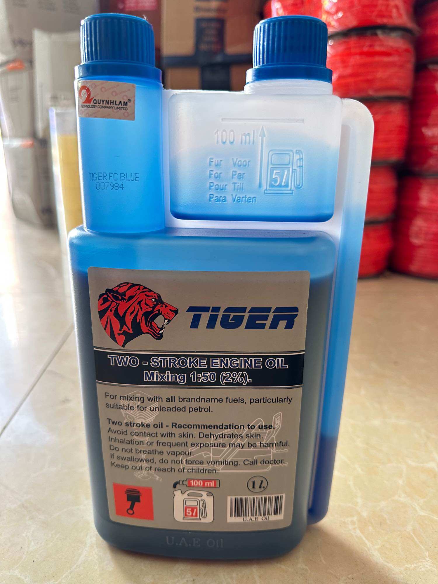Dầu ( nhớt ) 2 thì Tiger xanh