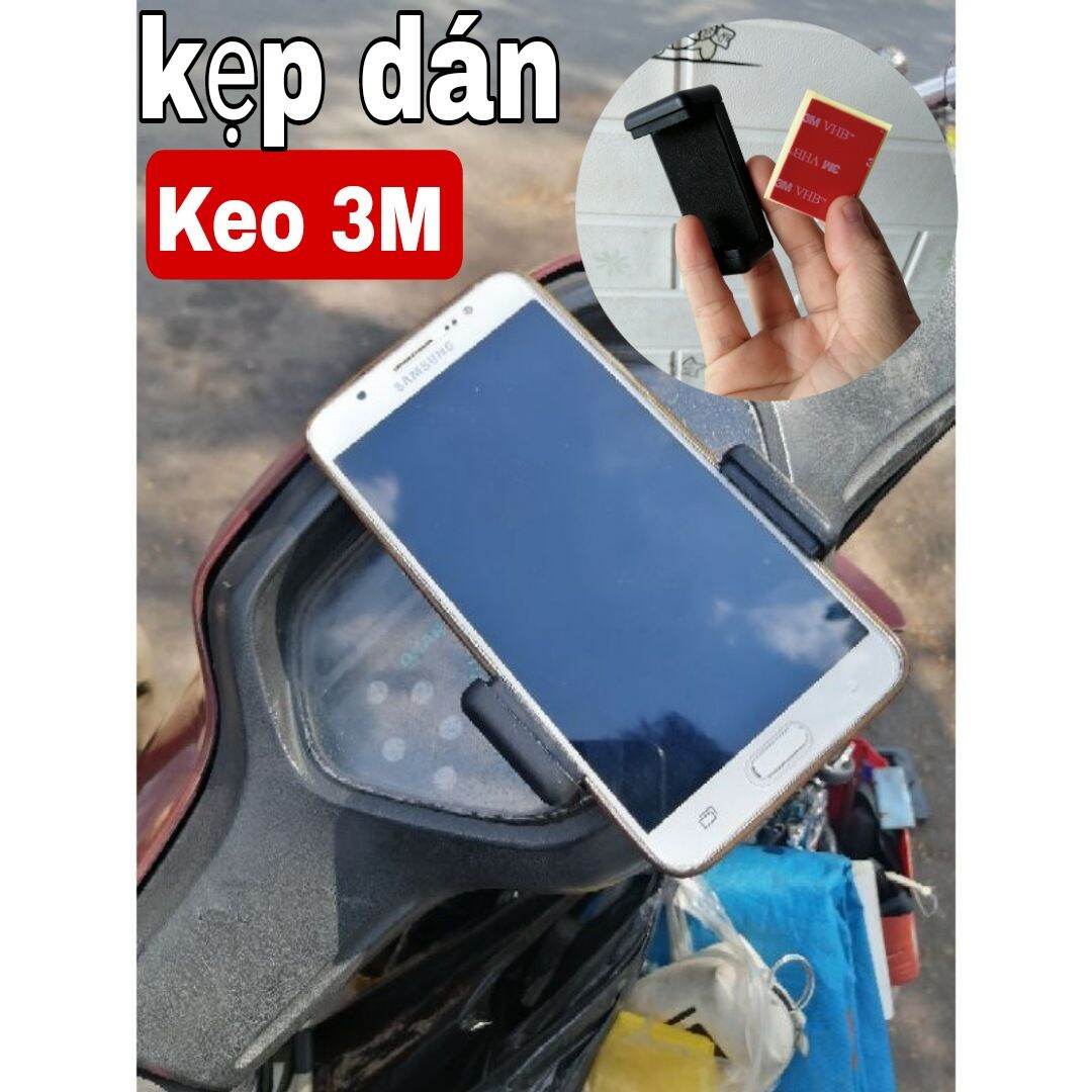 kẹp điện thoại dán trên mặt dồng hồ xe máy