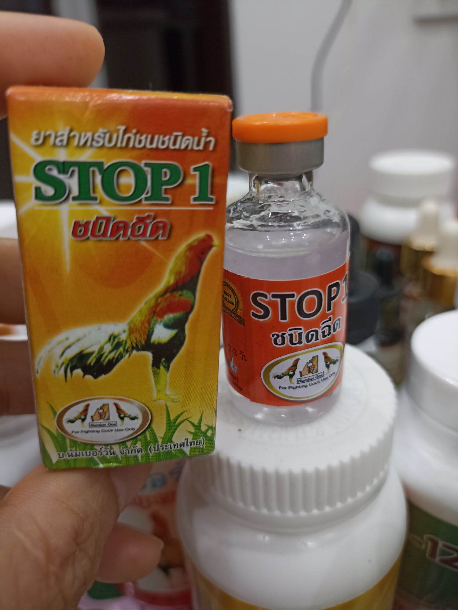 Stop1 (chai 10c): tri tang gà sau đá