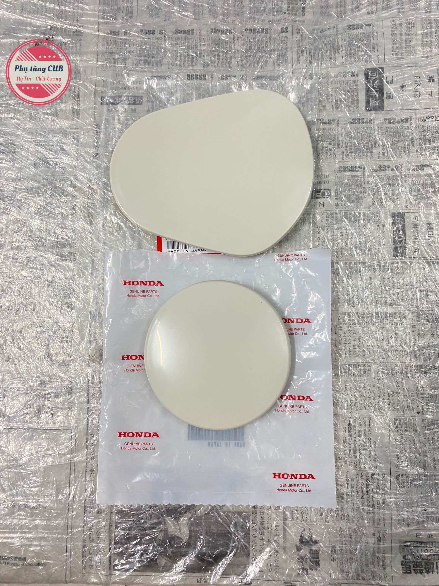 Nắp chụp lỗ bửng cub 81-82-86-88-dd màu ngà hàng zin mới
