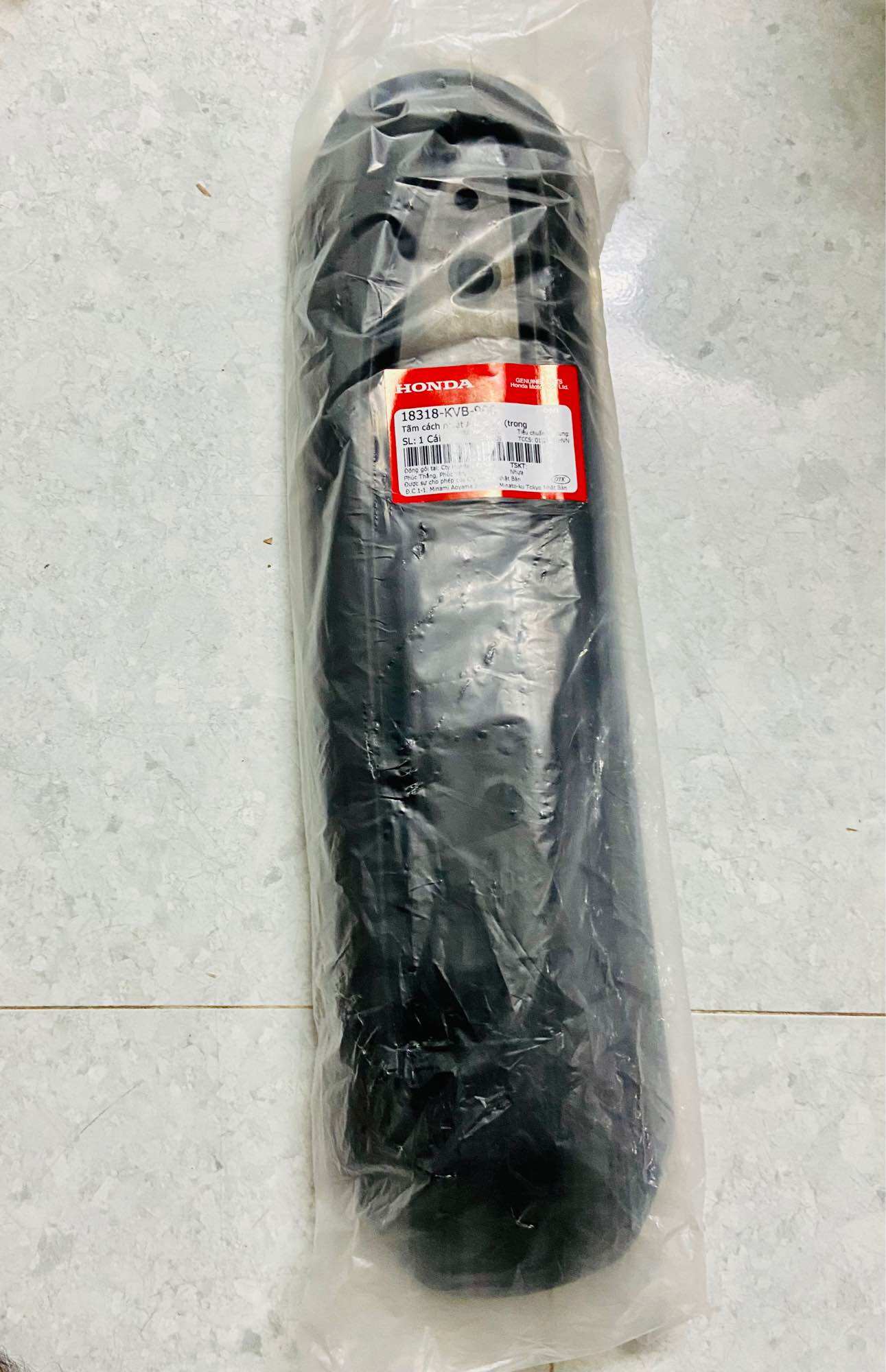 Tấm cách nhiệt ống xả honda click 110 đen + bạc /