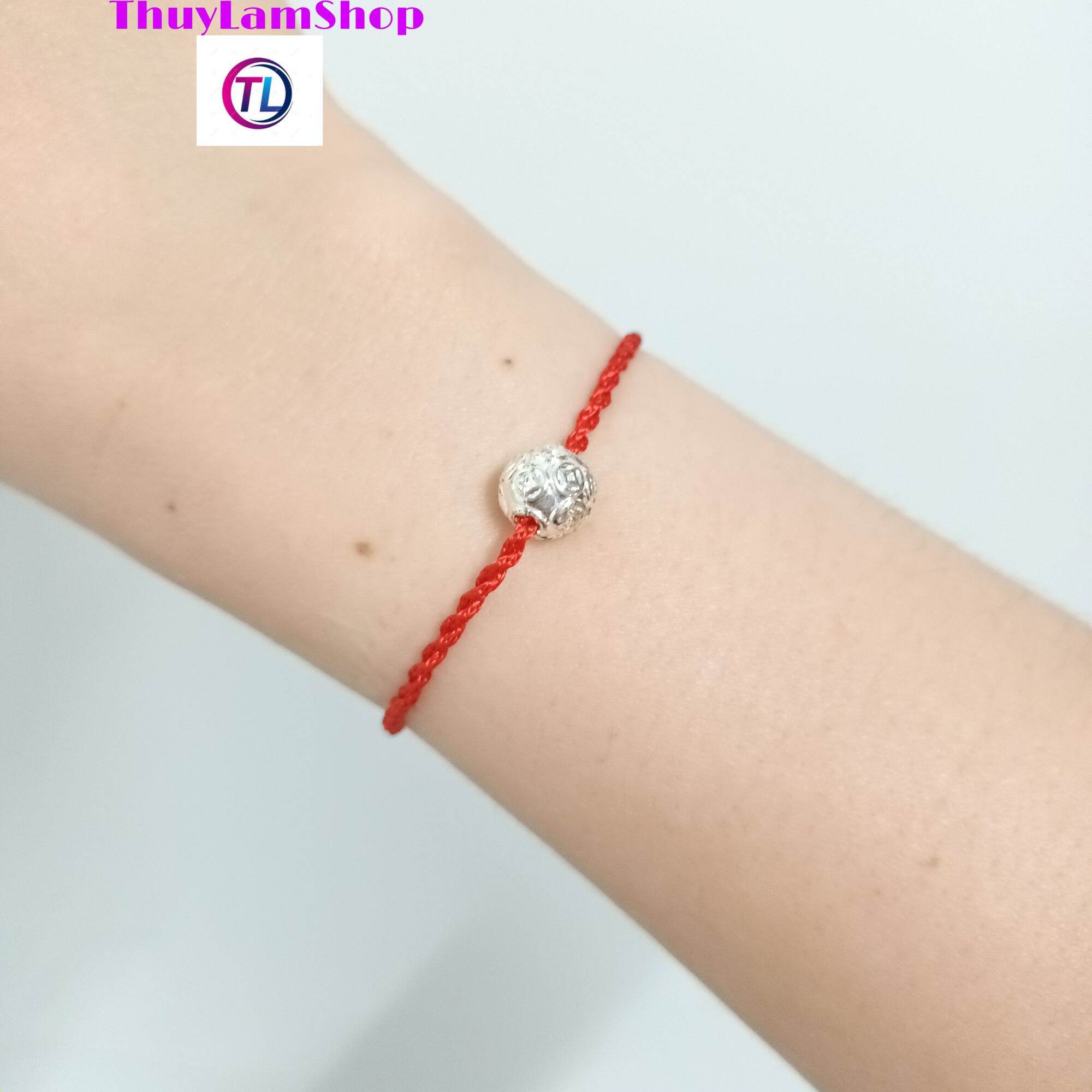 Vòng tay chỉ đỏ mix bi kim tiền may mắn tài lộc