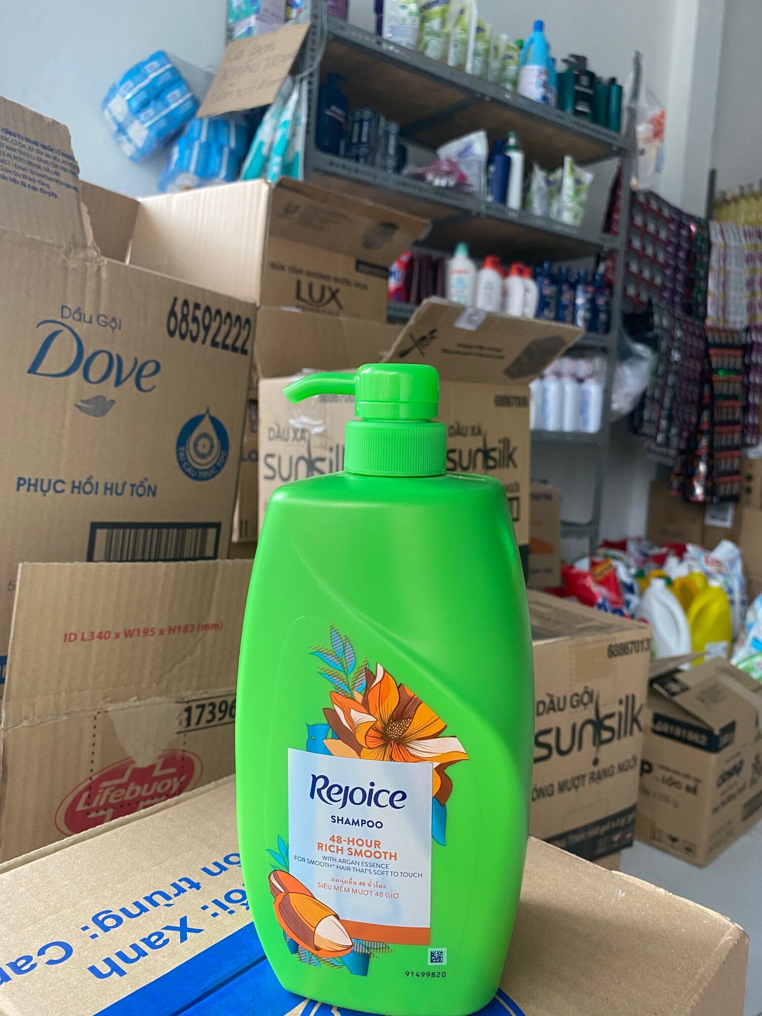 Dầu gội Rejoice mềm mượt chai 900ml