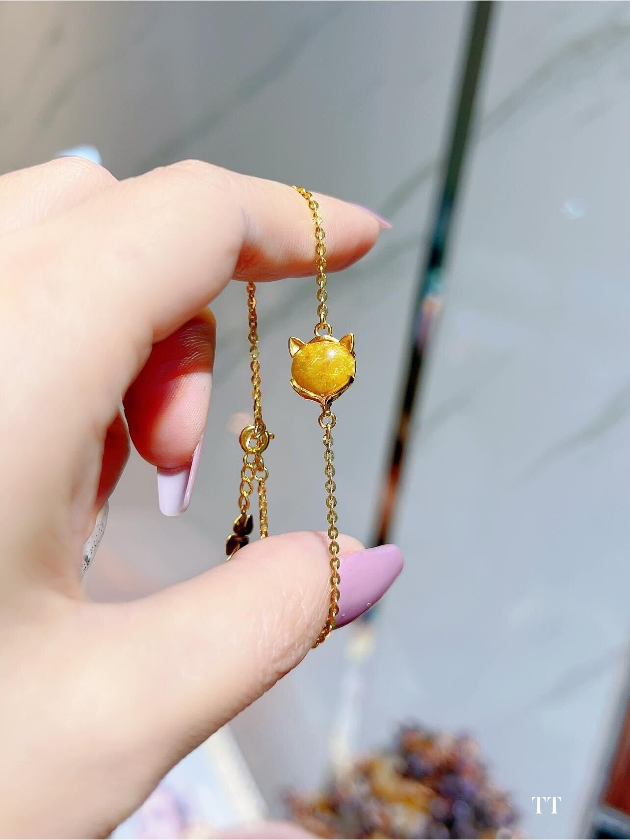 Lắc tay vàng tây hồ ly đá thạch anh tóc vàng VIP
