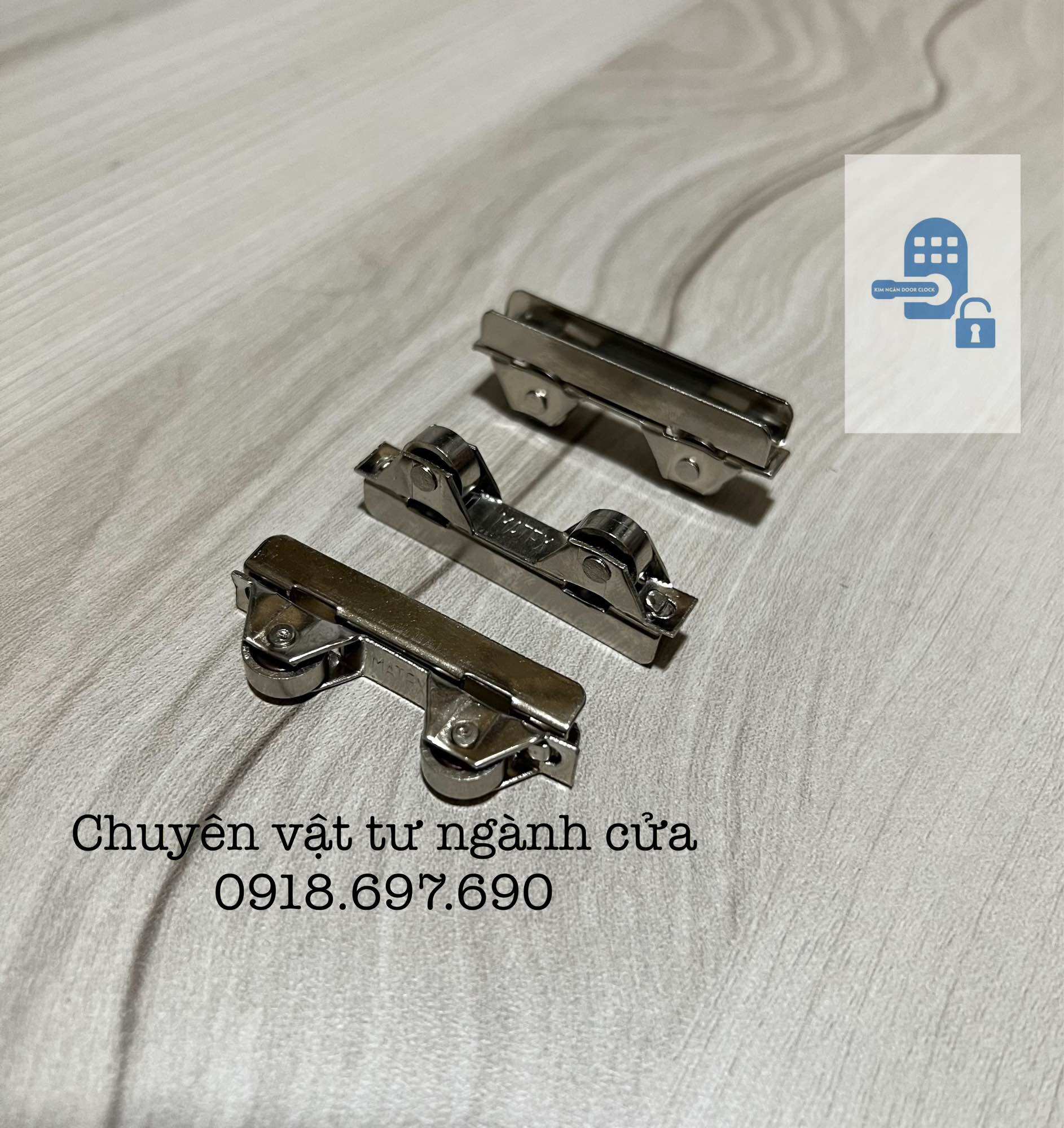 [ 10 bánh ] Bánh xe đôi kẹp kính tủ nhôm lùa .