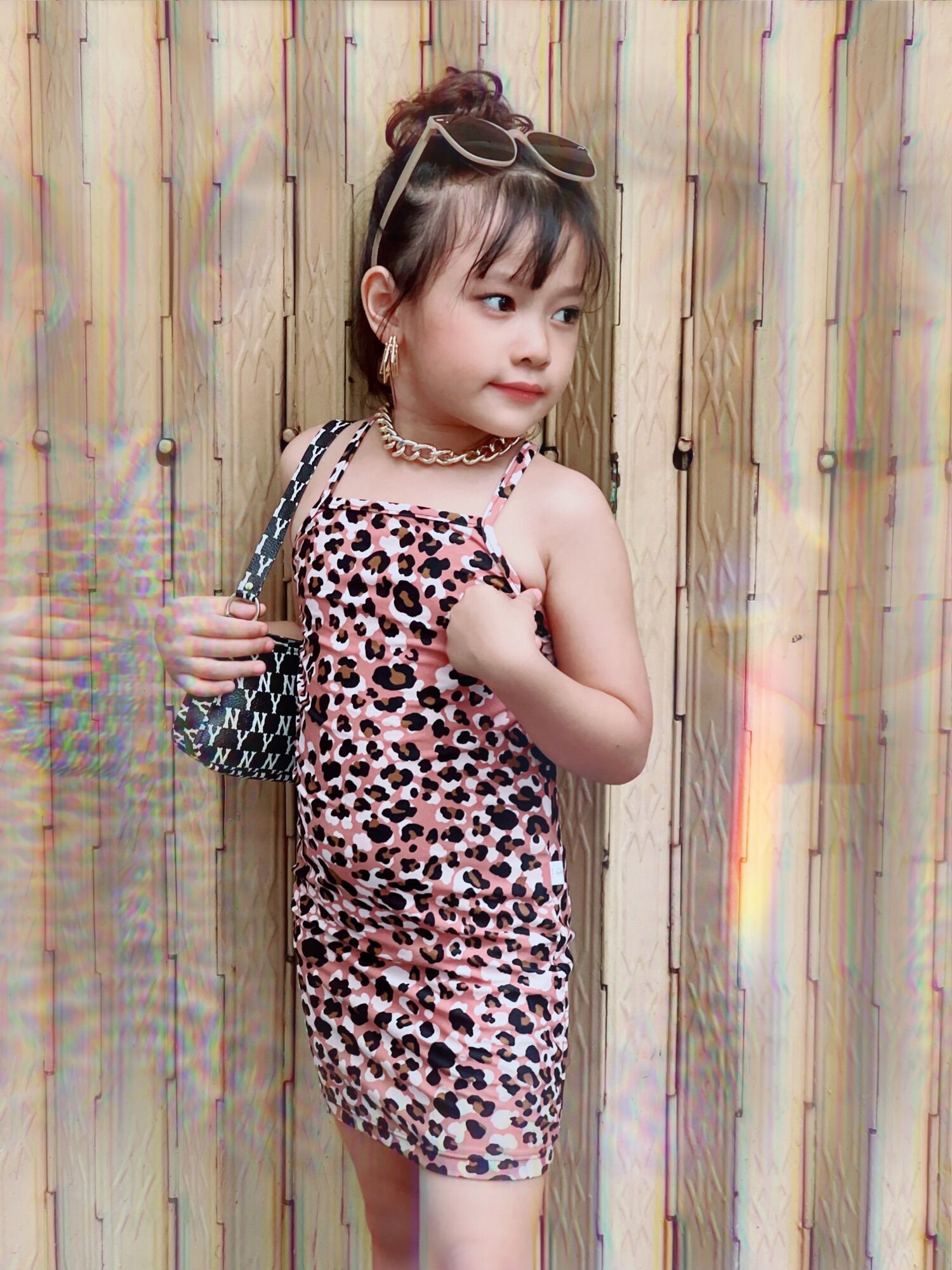 Đầm body hở lưng da beo cho bé