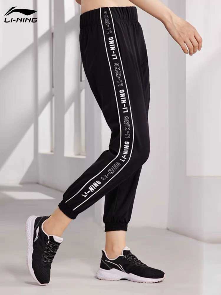 Quần gió nữ Lining AYKR136