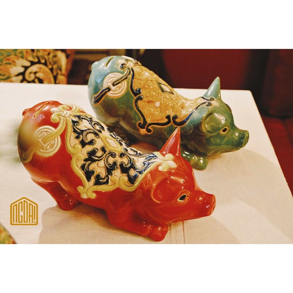 Heo mỹ nghệ đồng tiền