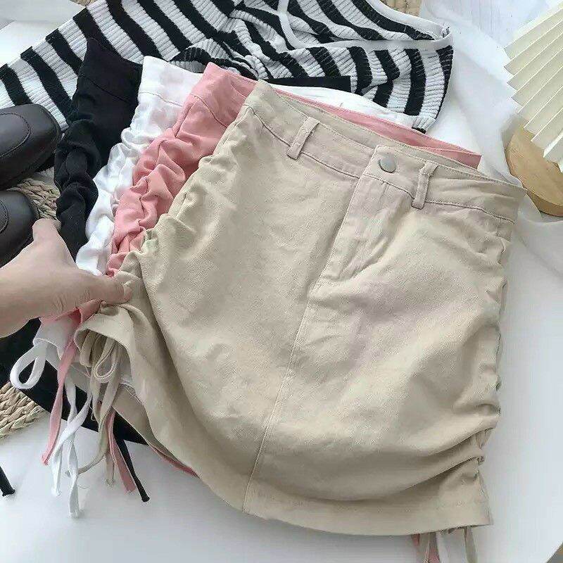 Chân váy kaki nút rút dây bên