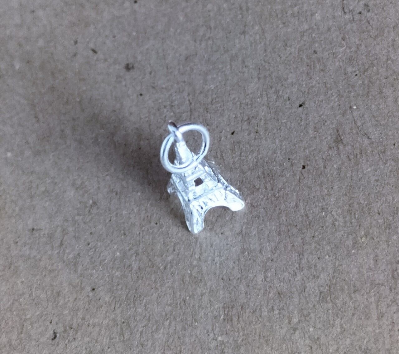Charm tháp Eiffel bạc 925 vĩnh viễn bảo hành