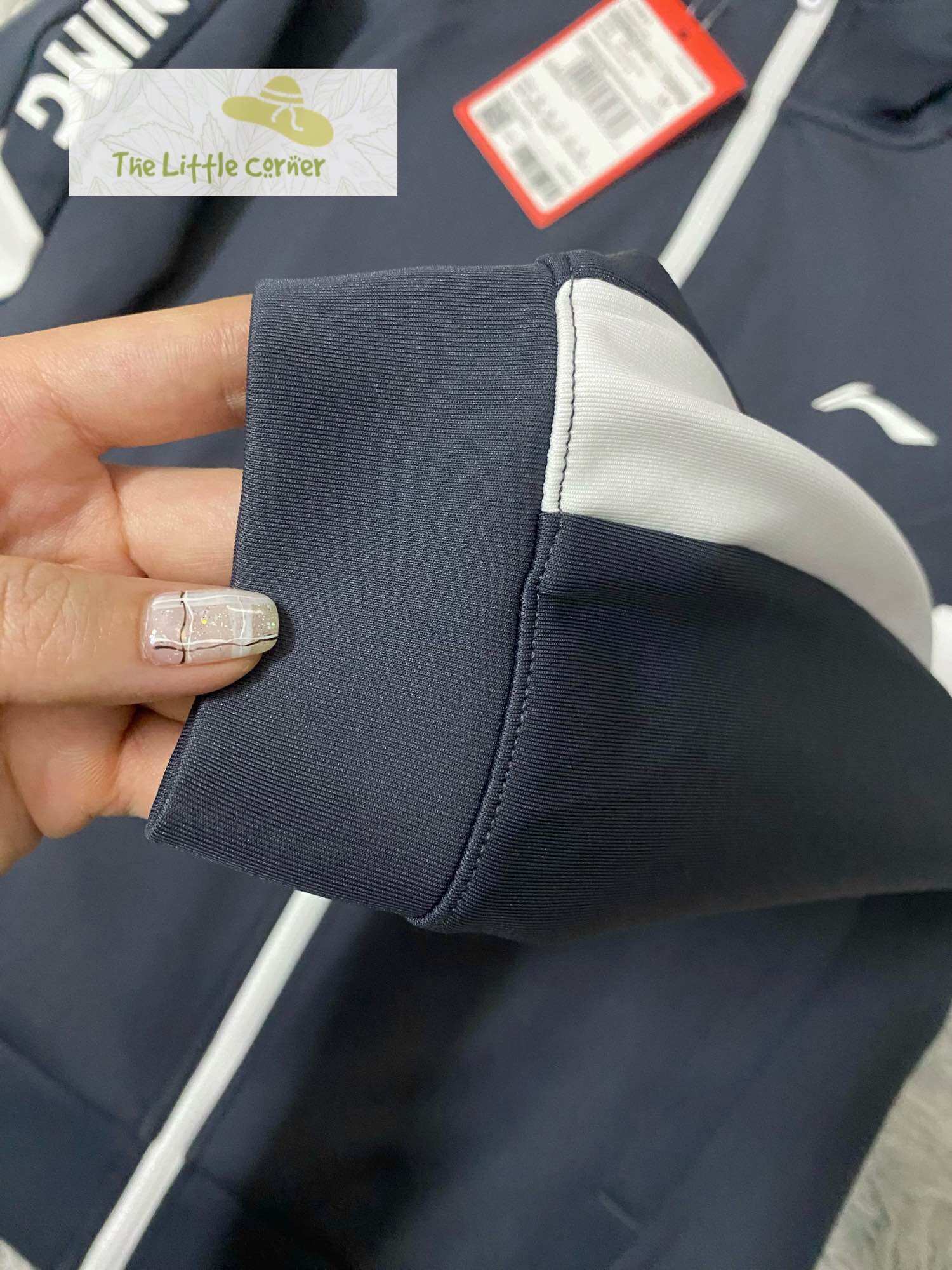 Áo khoác nỉ trơn nữ Lining AWDRB04