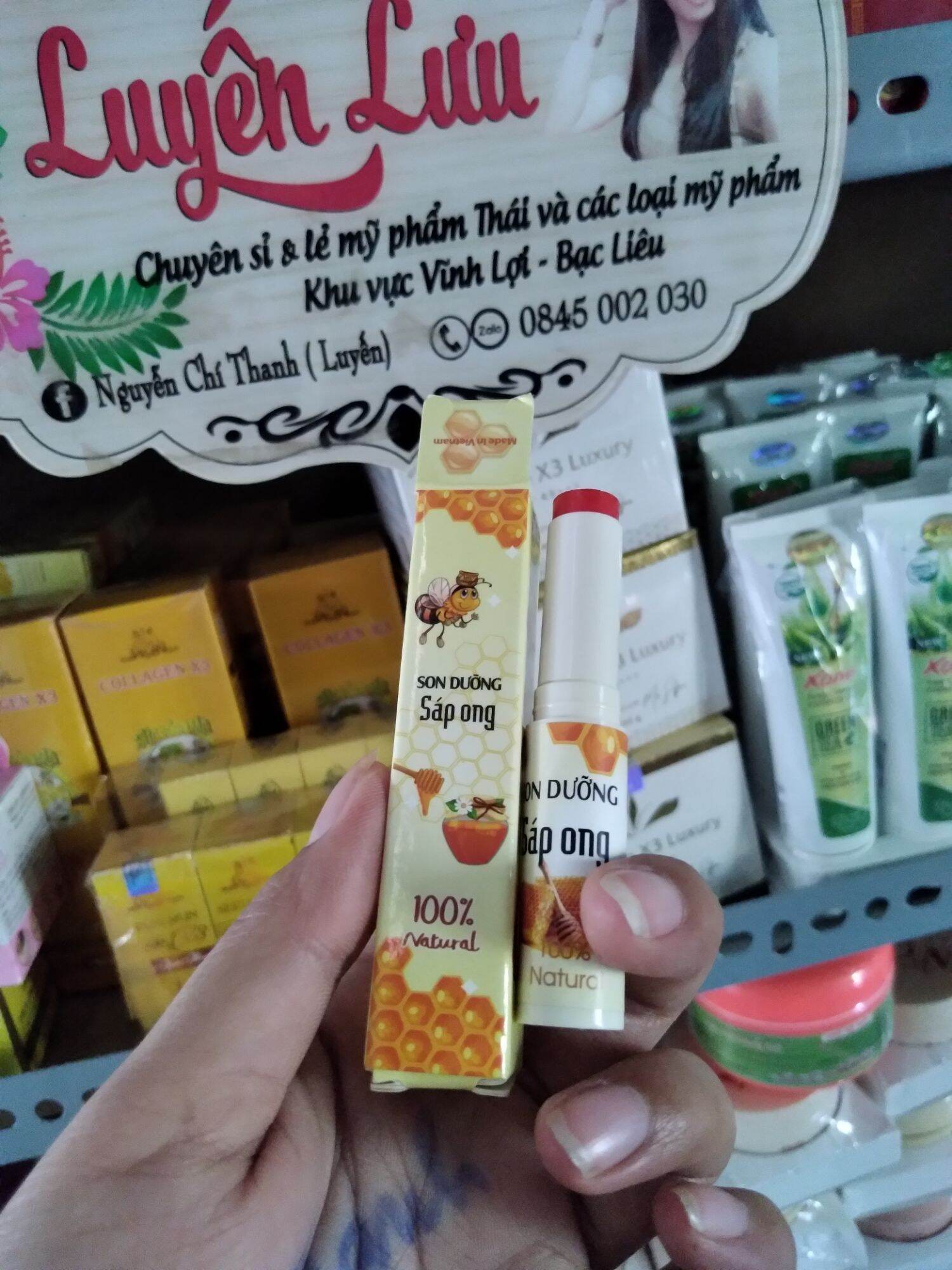 son dưỡng sáp ong màu đỏ cam