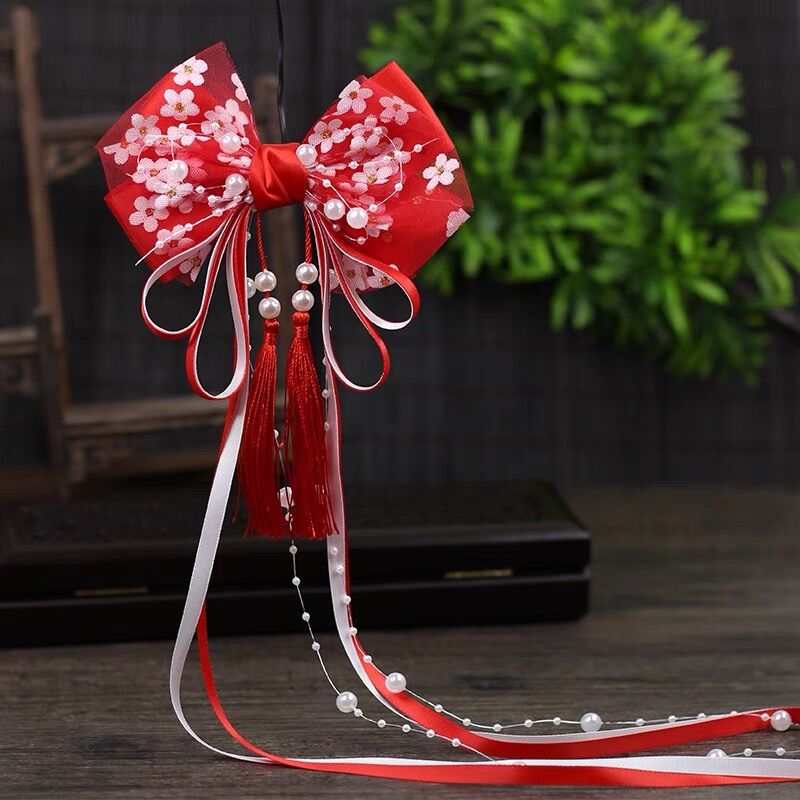 Kẹp nơ cổ trang cách điệu dây hạt trai