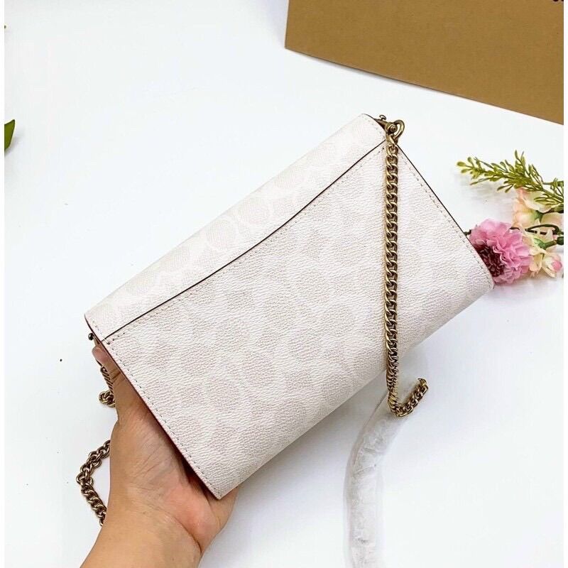 Túi đeo chéo kiêm clutch C0 ach tabby