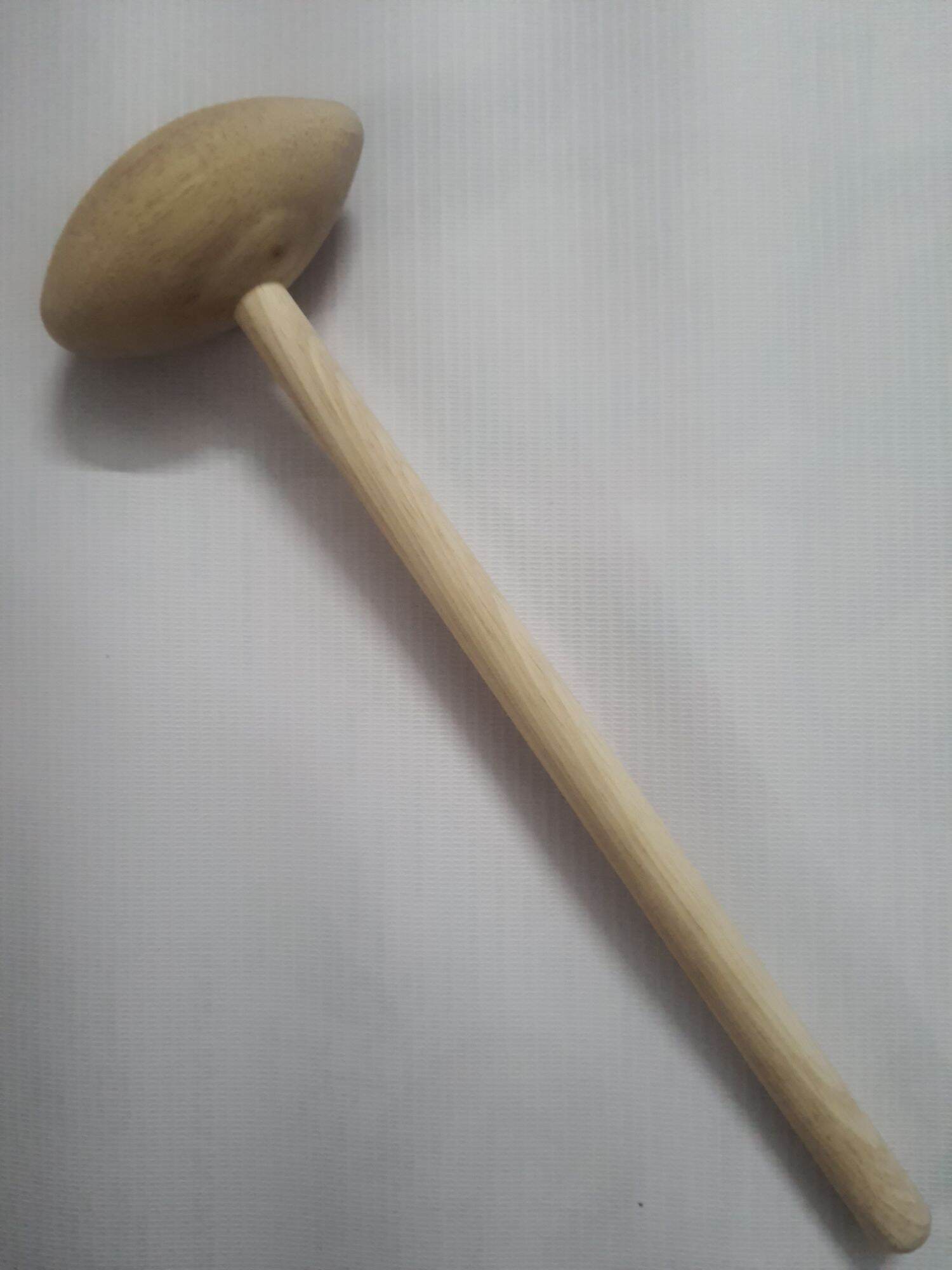 Búa gỗ gõ huyệt chân