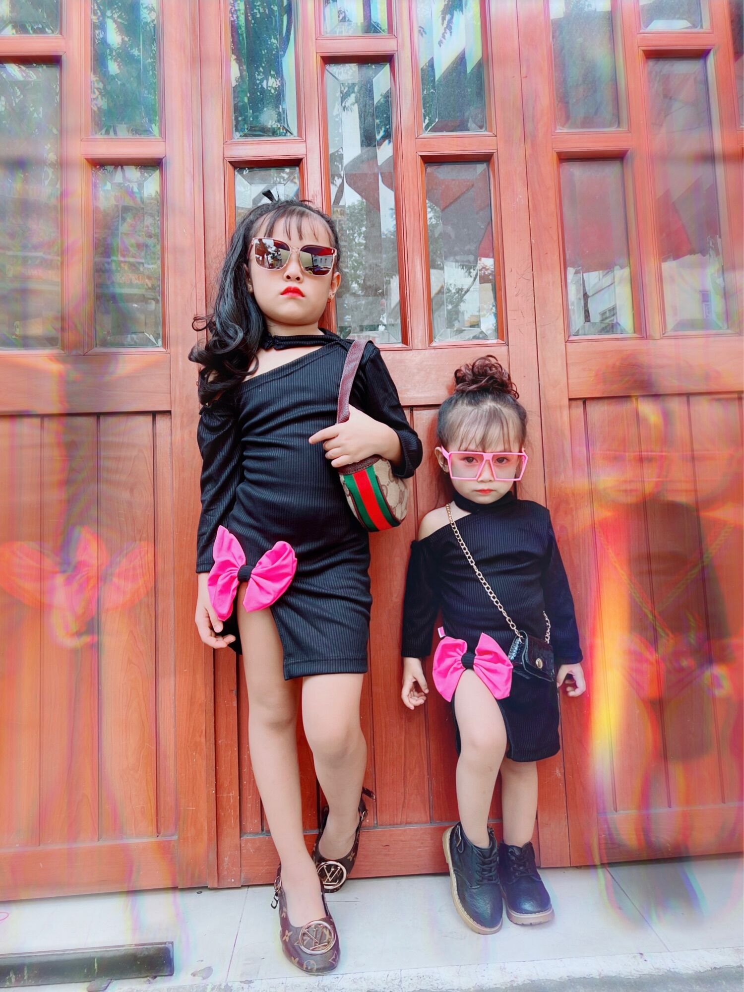Đầm body xẻ tà phối nơ cho bé gái