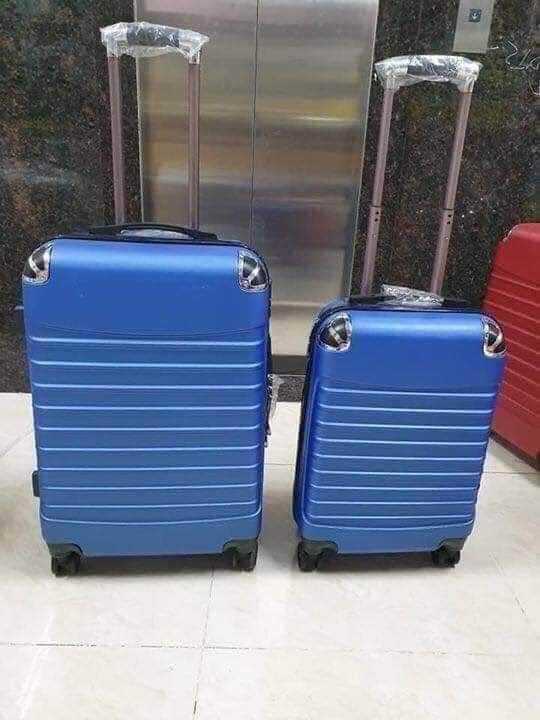 valy du lịch tay kéo có bánh xe