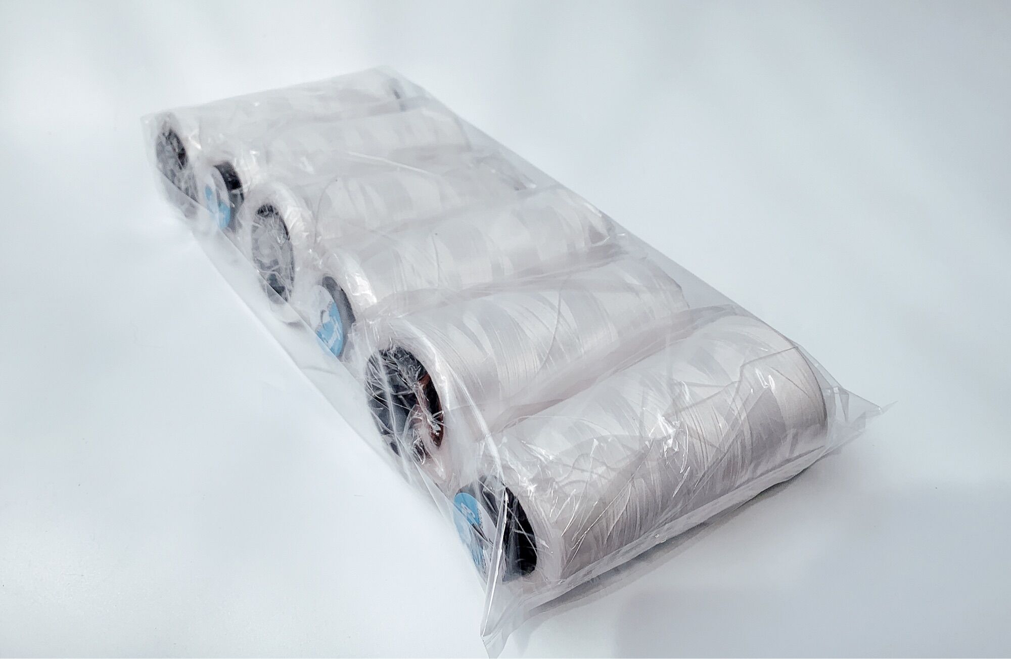 VỈ 6 CUỘN CHỈ TƠ VẮT SỔ TRẮNG