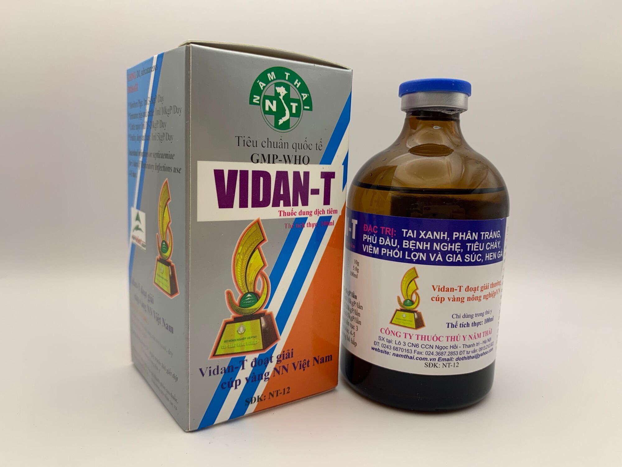 Vidan t 100ml - tai xanh, sưng phù đầu, phân trắng lợn con, tiêu chảy, viêm phổi lợn và gia súc.