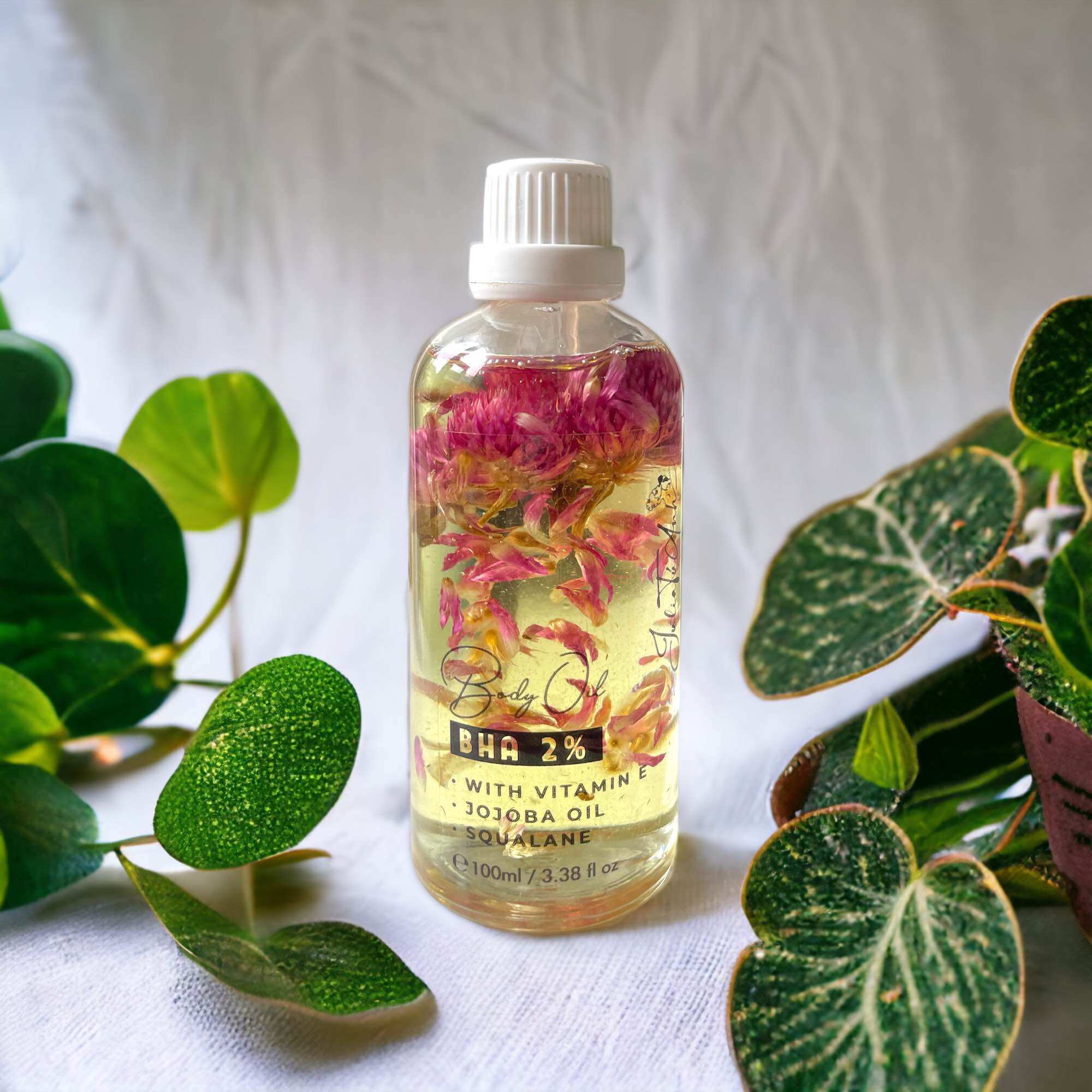 BODY OIL 2% BHA mix cúc bách nhật