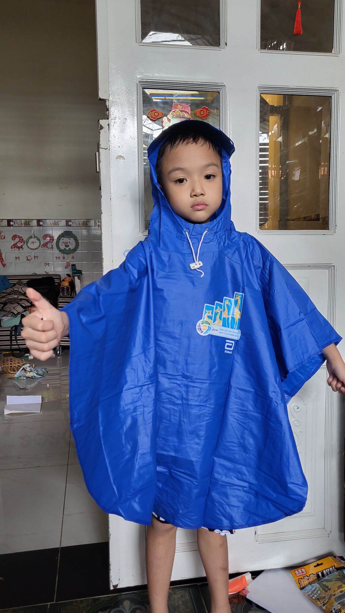 Raincoat for Baby as a Gift of Milk