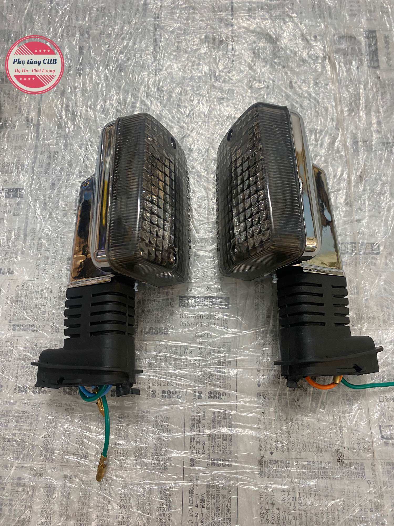 Xi nhan xe cub 82-84-DD màu khói