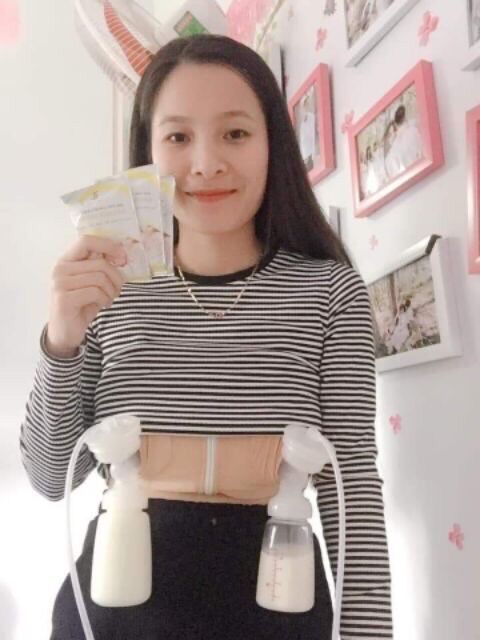 Áo hút sữa rảnh tay dùng máy hút sữa