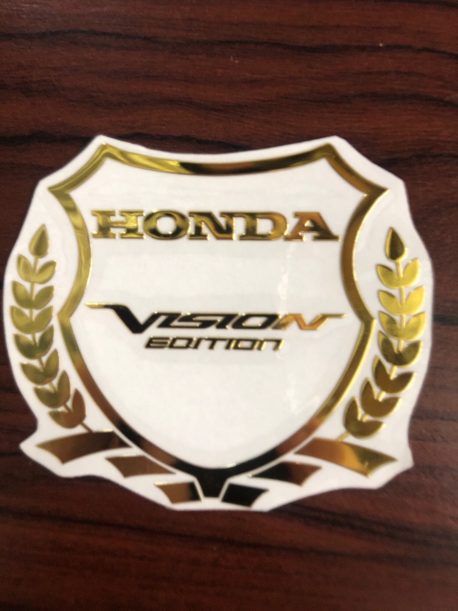 Logo kẽm honda bông lúa vision vàng