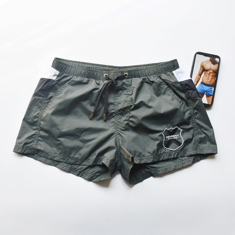 Quần Short Thể Thao Nam Eo Thấp Gợi Cảm Quần Chạy Bộ Mùa Hè Quần Đi Biển Nhanh Khô Thoáng Khí Quần Thể Thao Hai Mảnh