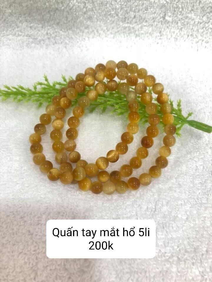 Vòng quấn tay đá mắt hổ 6li