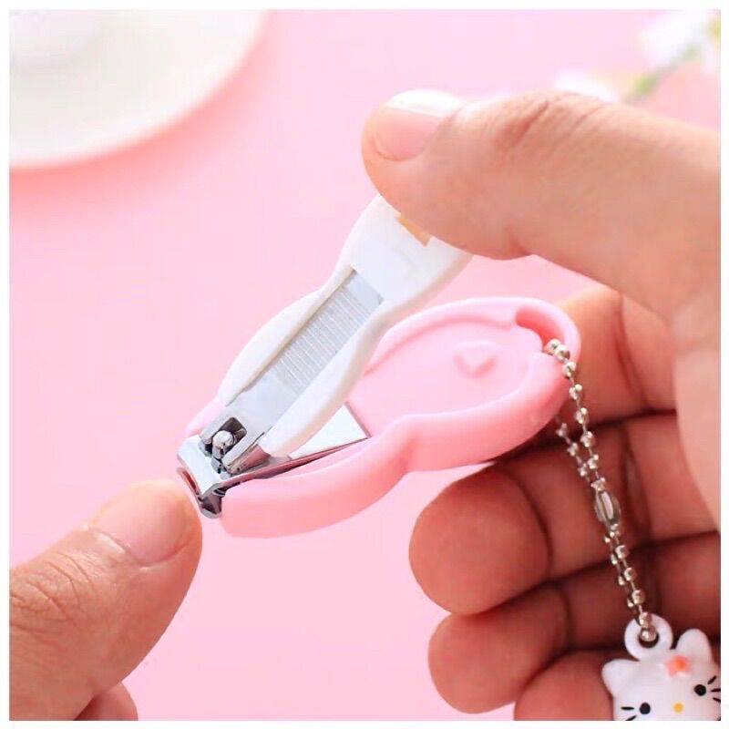 Bấm móng tay Hello Kitty - Doremon Doraemon