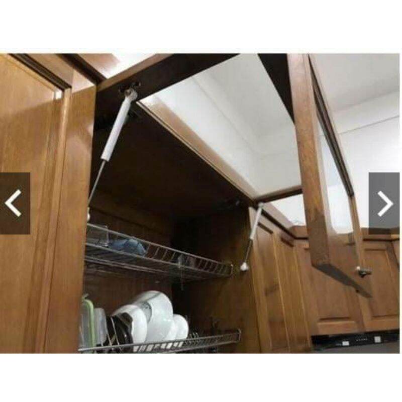 Pittong tay nâng hạ cánh tủ