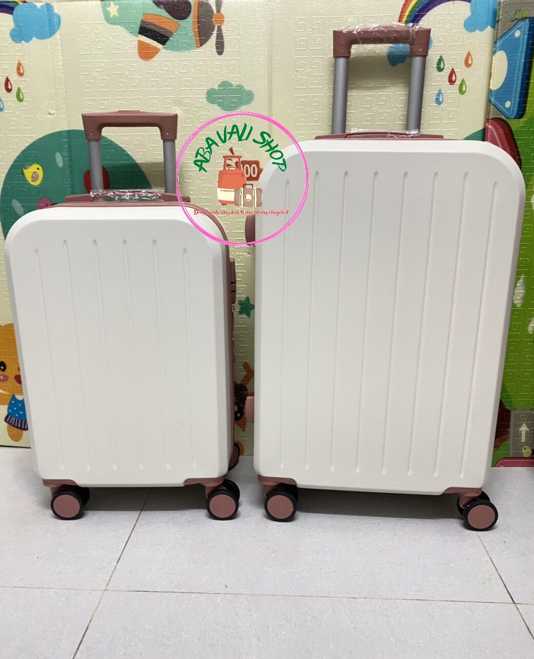 Vali nhựa cao cấp màu trắng viền hồng 24 inch