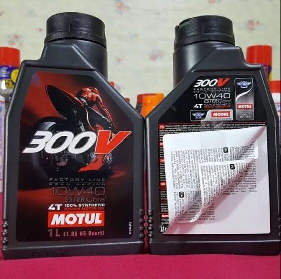 1 lít 4 nhớt motul 300v 3 lớp pháp 10w-40 full tổng họp