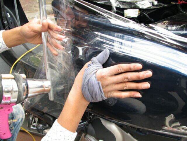 máy sấy dán decal,khò dán keo xe