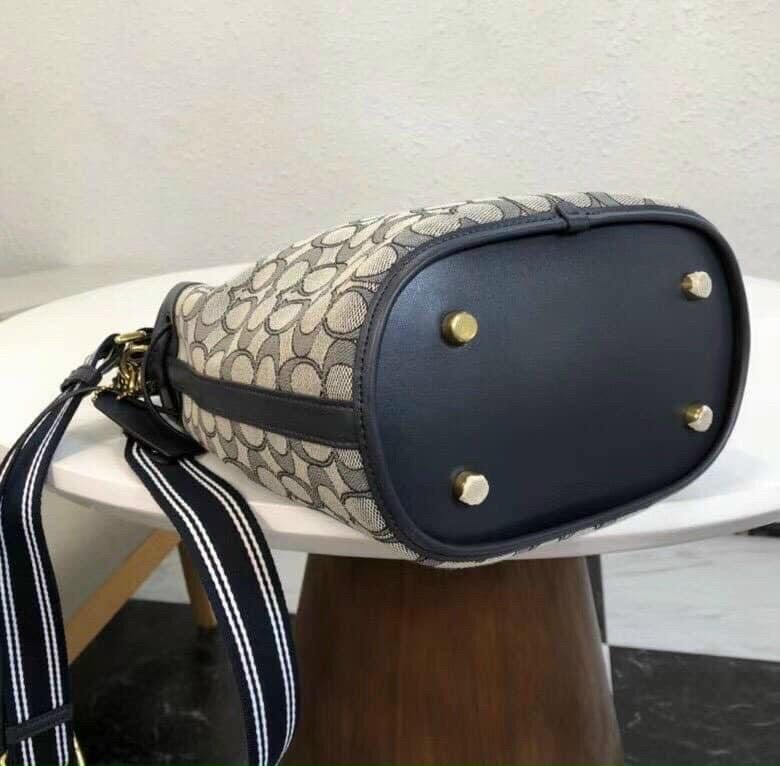 C0ACH Field Bucket Bag In Signature